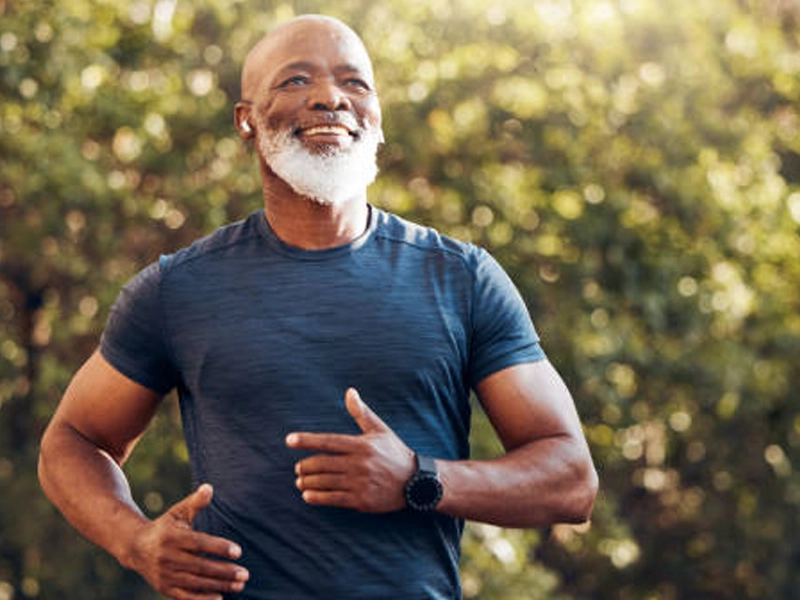 Active senior man jogging outdoors